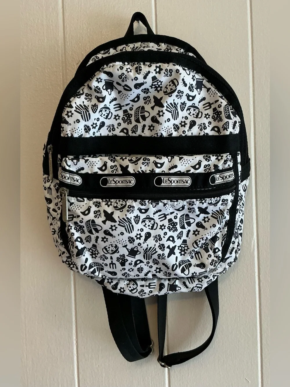 A rare LeSportsac nylon Garden Club Retired Print Mini Backpack Bag